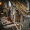 a large ornate room with a large staircase